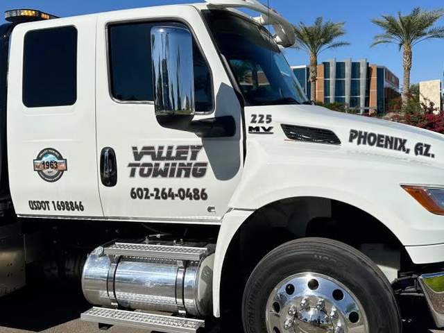 collision repair services tow truck